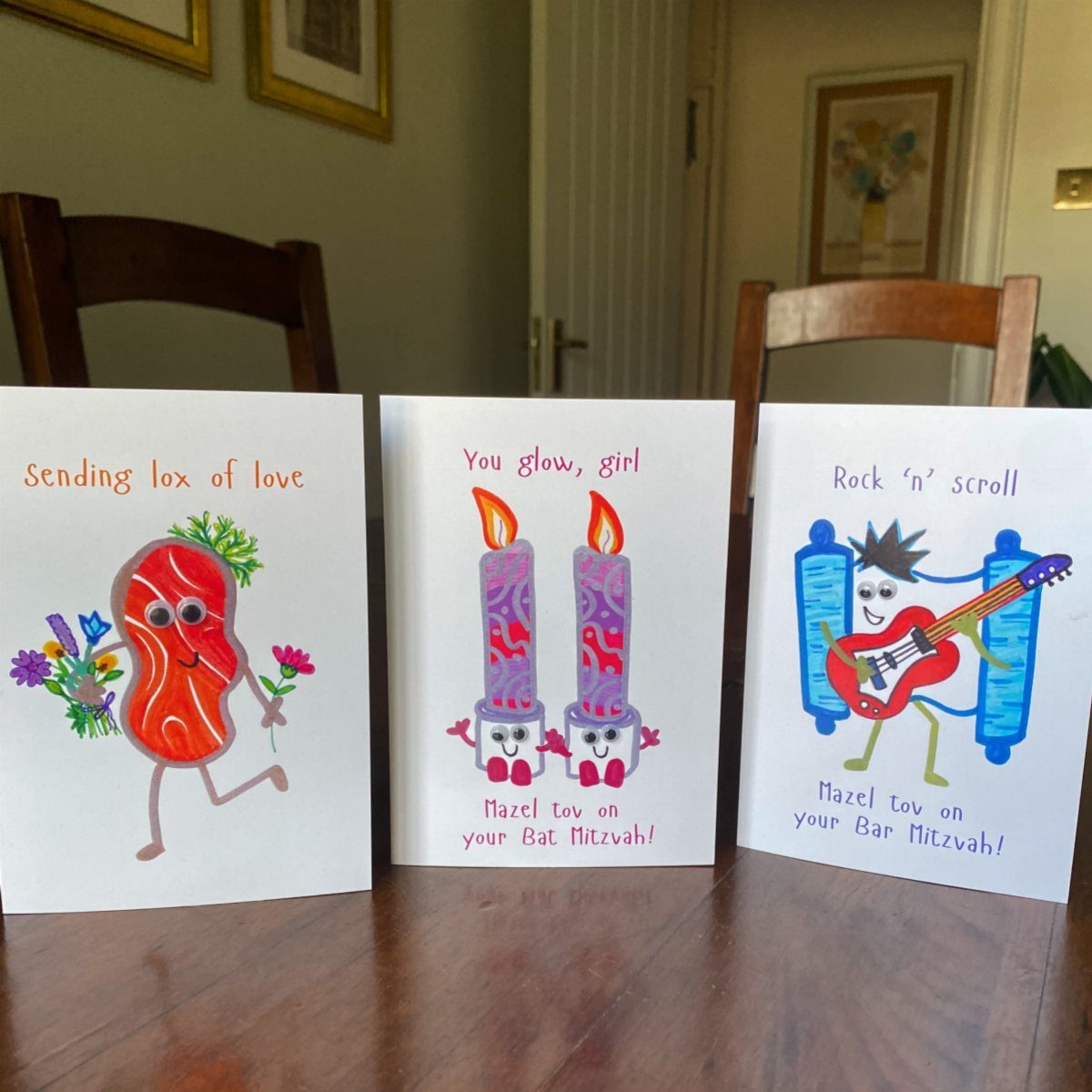 Three handmade Bat and Bar Mitzvah cards with funny puns and colorful illustrations.