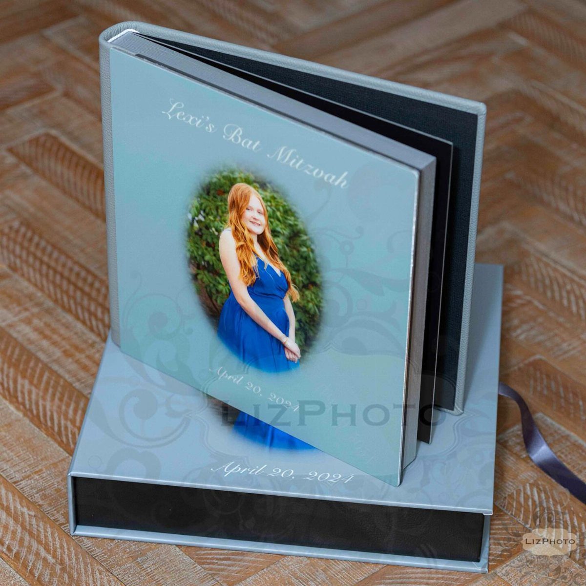 Personalized Bat Mitzvah photo album and matching box on a wooden floor