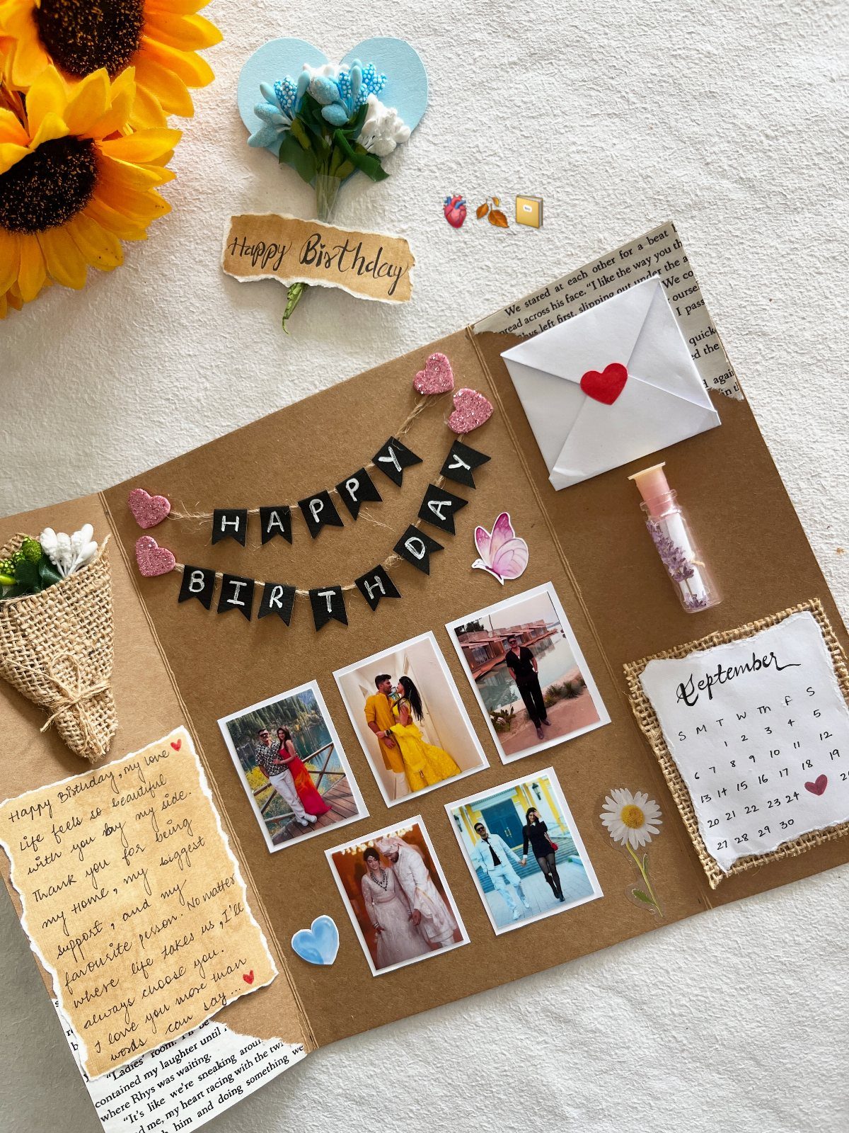 Handmade brown birthday card with a black banner, couple photos, and a calendar.
