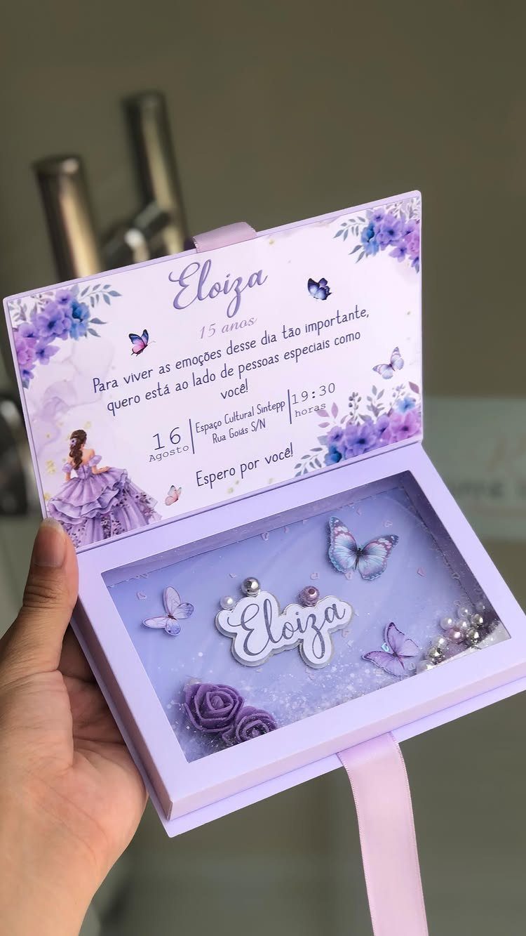 Purple birthday invitation box with 3D name, butterflies, and floral printed card.