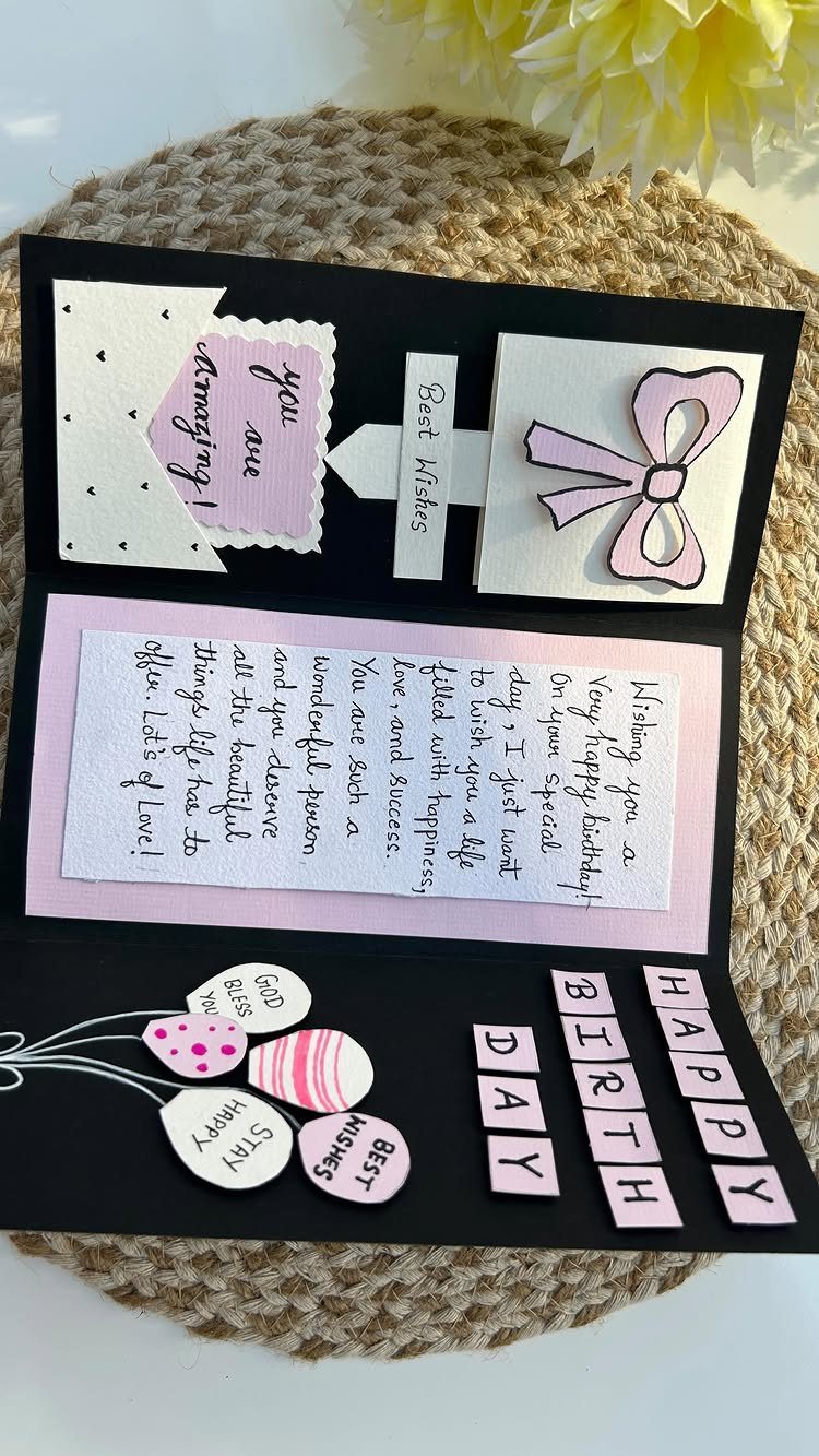 Handmade birthday card with pink accents, a bow, and handwritten birthday wishes.